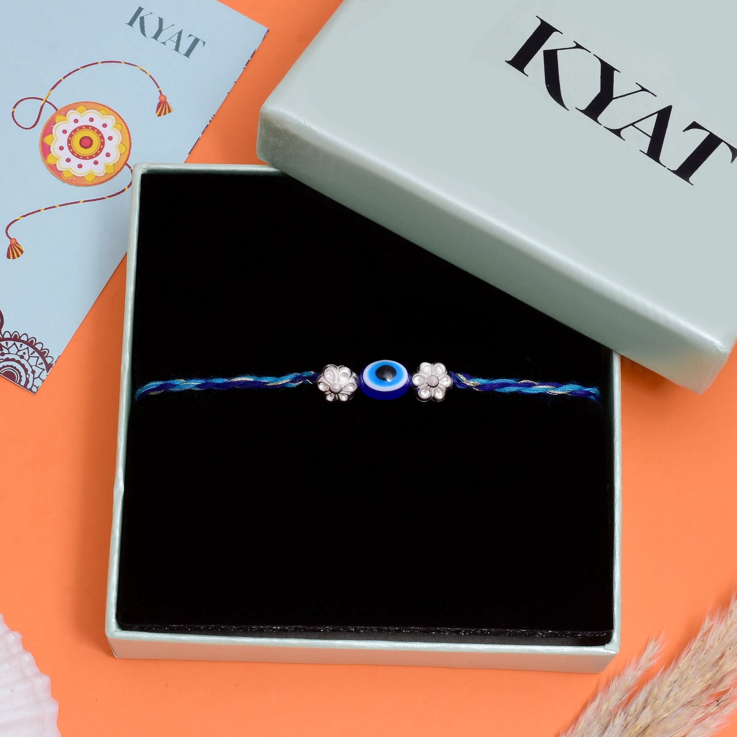 Nazariya Silver Flower Rakhi