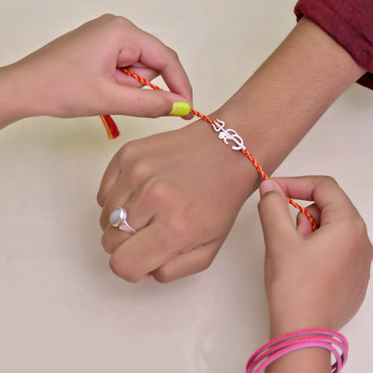 om silver rakhi