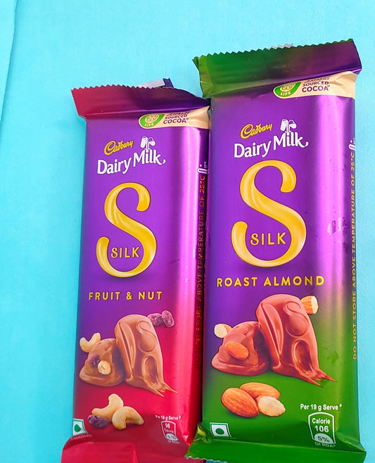 silver shree rakhi with chocolate