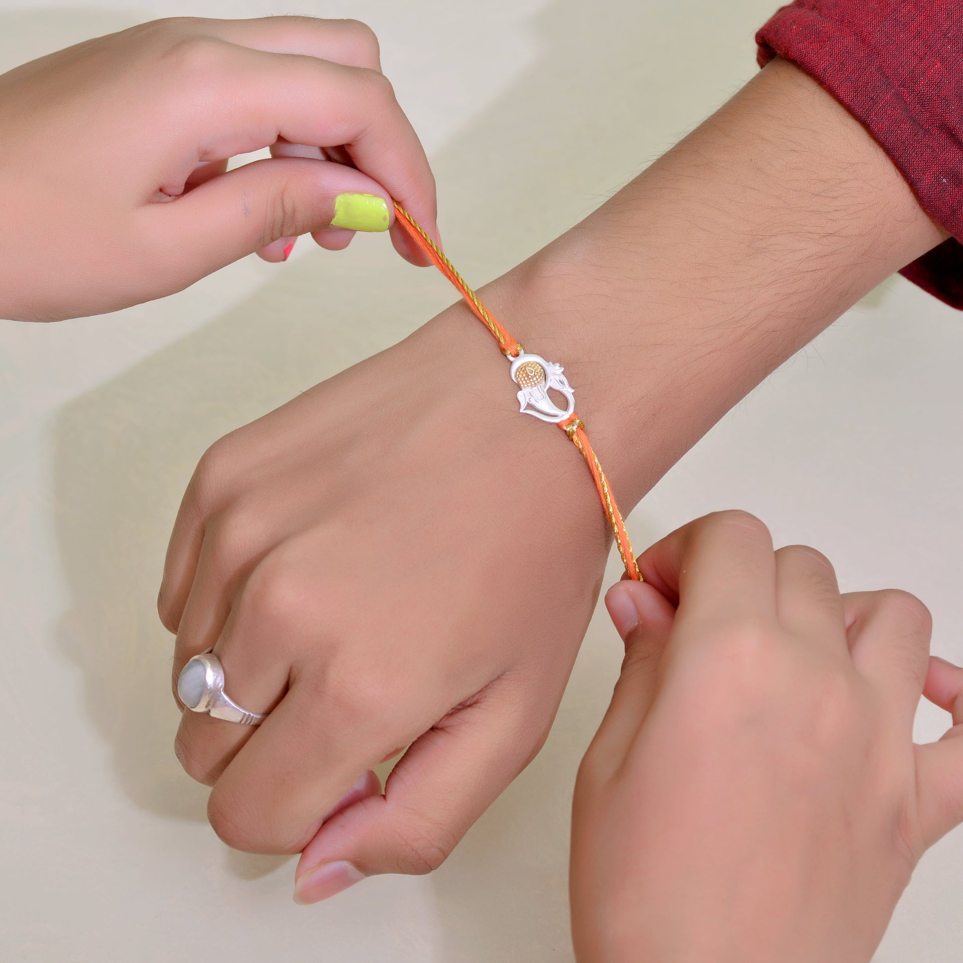 rakhi ganesha charm 