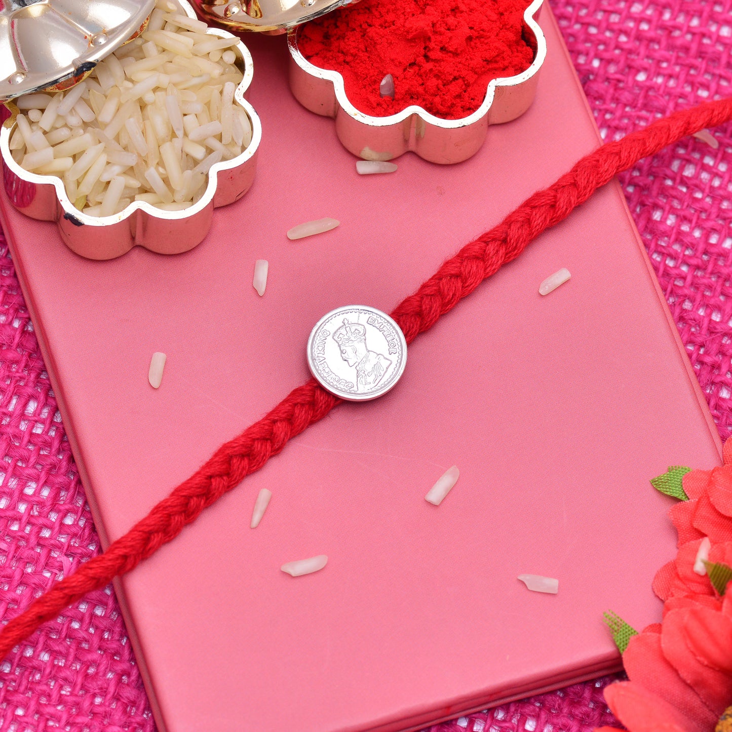 rakhi with silver coin