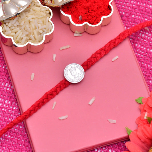 rakhi with silver coin